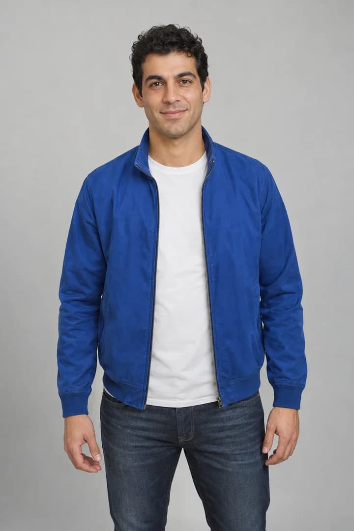 Fictional adult with short curly hair wearing a cobalt-blue jacket